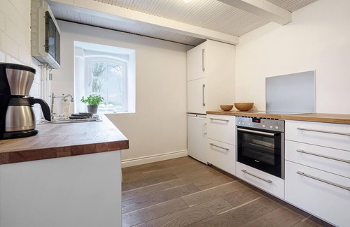 Langballig House | Favorite place by the sea - vacation home Klüterkammer on an estate with Baltic Sea charm and