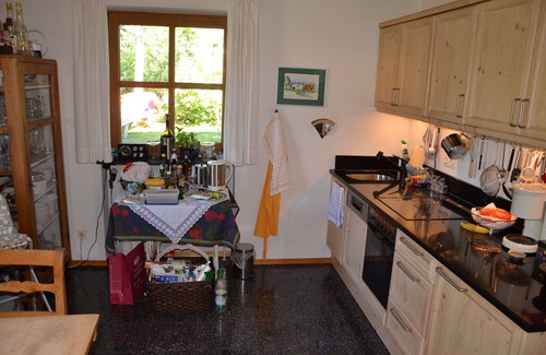 Lenggries House | Feel-good holiday home by the stream with a large garden and Brauneck mountain view