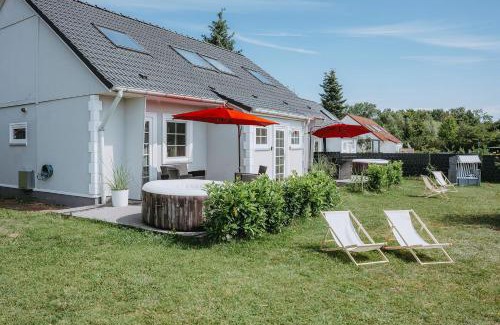 Luetow House | Ferienhäuser Insel Usedom Haus Samara 8 - Blick aufs Achterwasser! Whirlpool und Sauna