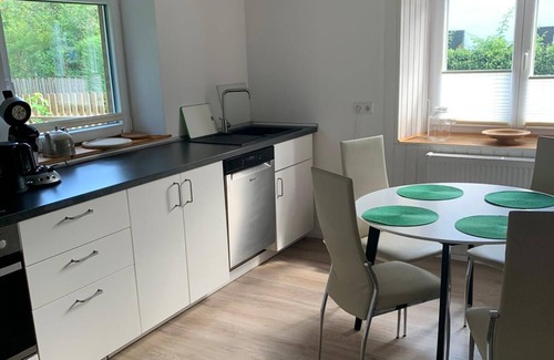 Laugna House | Ferienhaus am Bach