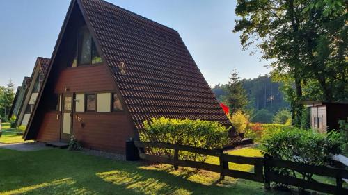 Machtlos House | Ferienhaus am Wald