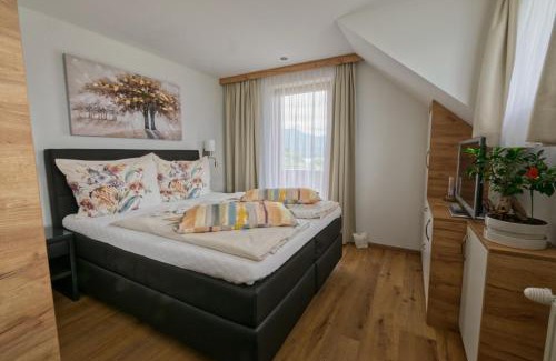 Egg am Faaker See Apartment | Ferienhaus Holzer
