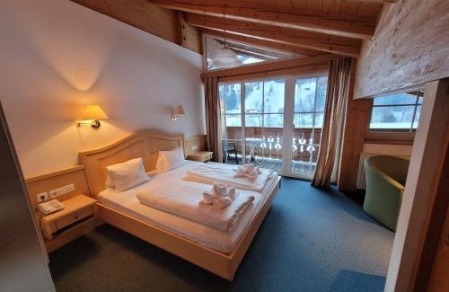 Unteraurach Hotel | Ferienhotel Alpenhof