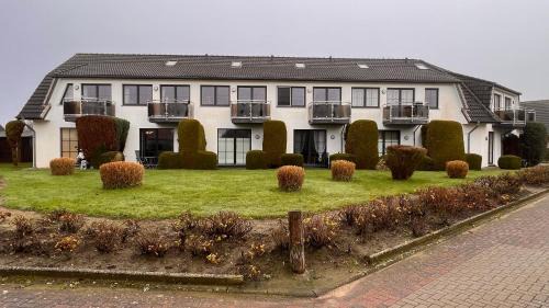 Dorumer Neufeld Apartment | Ferienwohnung am Kormoranweg