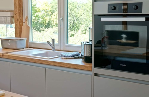 Brodersby Apartment | Ferienwohnung "scheunenloft" in Brodersby-burg