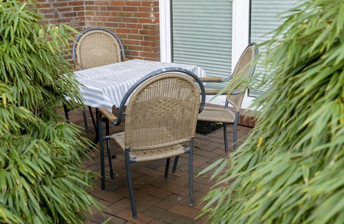 Langeoog Apartment | Ferienwohnung "töwernüst" im Schönen Freesenhoff an der Hafenstraße am Ortsrand