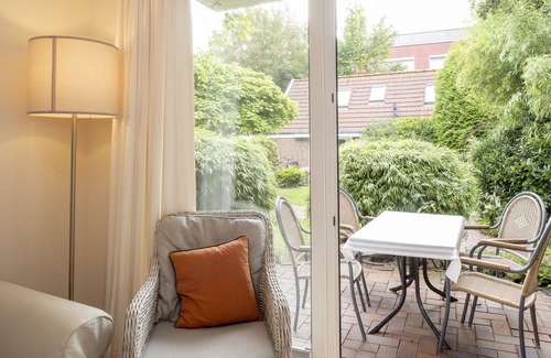 Langeoog Apartment | Ferienwohnung "töwernüst" im Schönen Freesenhoff an der Hafenstraße am Ortsrand