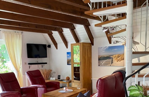 Dorumer Neufeld House | Fireplace, 16: 9 HD TV, 5: 1 sound, cozy, high quality, solid beach chair on the beach