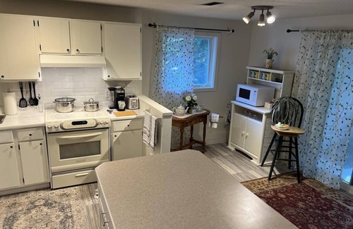 North Saanich House | FireThorn Manor: Spacious, well appointed 2 Bedroom Garden Suite with King Bed.