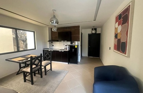 Alto Boquete Hotel | First floor room with small living room and kitchenette