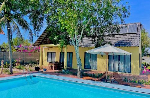 Ham Tan Apartment | Fisherman Village Boutique Villas - Beachfront