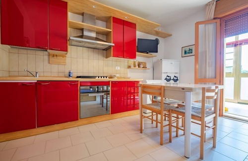 Lido delle Nazioni Apartment | Flat in residence with pool, air conditioning and dishwasher