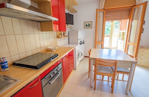Lido delle Nazioni Apartment | Flat in residence with pool, air conditioning and dishwasher