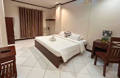 Puerto Princesa City Centre Hotel | Flores De Musa by Curv Hotels
