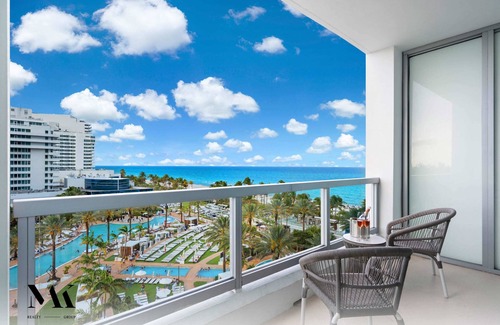 Mid Beach Apartment | FountaineBleau Resort, Balcony w/Ocean & Pool View