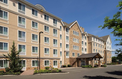 North Brunswick Condo | Free Breakfast. Pool & Hot Tub. Quick Drive to Rutgers University!
