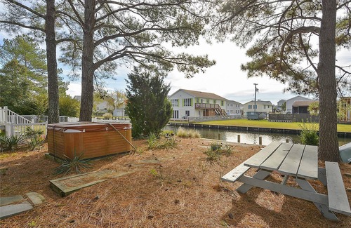 Sandpiper Pines House | FREE DAILY ACTIVITIES! Located on a canal in South Bethany includes 3 bedrooms, 2 baths,