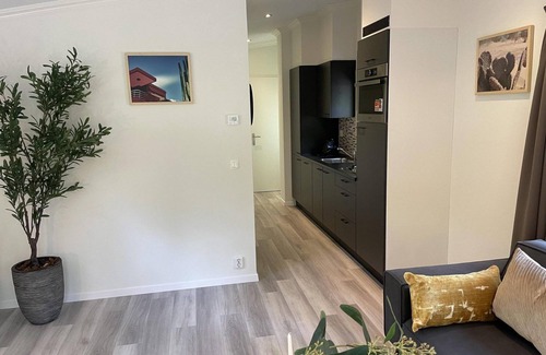 Terwolde House | Freestanding chalet for four persons, fully furnished. Located at the water.