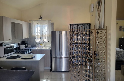 Portmore House | Friendly gated community comfort home