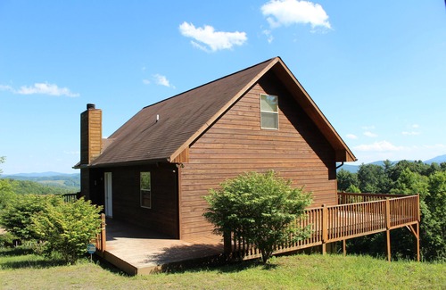 Grassy Creek Cabin | From Fireplace Evenings to Deckside Sunsets- Above It All Has It All