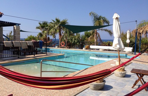 Pomos Villa | Front beach 3 bedrooms VIlla, huge heated swimming pool 15X5X10 meters L shape