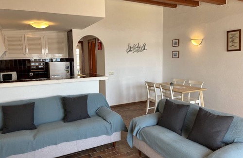 Fornells Apartment | Front sea line and with pool in Fornells