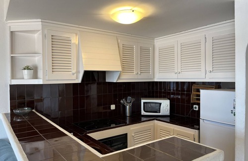 Fornells Apartment | Front sea line and with pool in Fornells