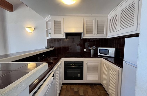 Fornells Apartment | Front sea line and with pool in Fornells