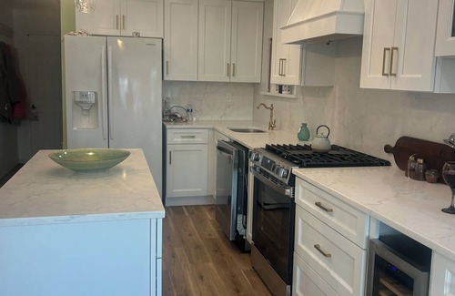 Mystic Island House | Fully upgraded home with gourmet kitchen waterfront outdoor oasis lanai,