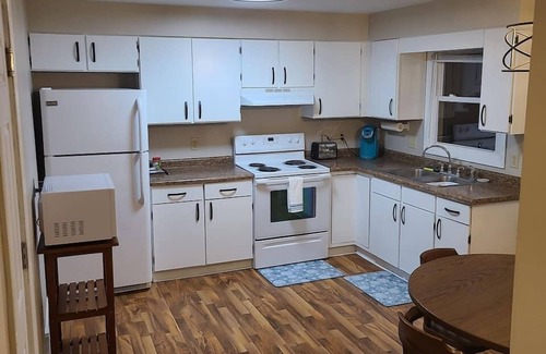 Neenah House | Furnished 2 bedroom with attached garage