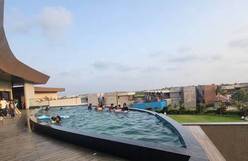 Olpad House | Furnished 3 BHK villa with infinity swimming pool, restaurant and game zone.