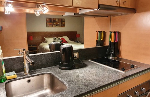 Santiago Apartment | Furnished apartment with equipped terrace and air conditioning.