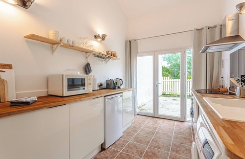 Puyravault House | Gabae - Les Volets Gris: Cozy Holiday Home with Wi-Fi and Remote Work Space