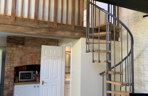 Farthinghoe Cottage | Garden Barn - studio style converted barn with garden