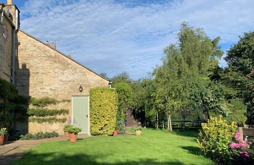 Farthinghoe Cottage | Garden Barn - studio style converted barn with garden