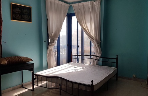 Abu Dhabi City Center Condo | Garden facing spacious room in AbuDhabi near beach