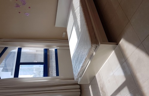 Abu Dhabi City Center Condo | Garden facing spacious room in AbuDhabi near beach
