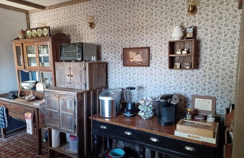 Claremore Cottage | Garden Room and Living area/Kitchen downstairs