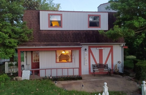 Claremore Cottage | Garden Room and Living area/Kitchen downstairs