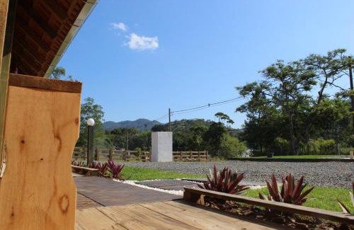 Pomerode Cabin | Garten Chalés