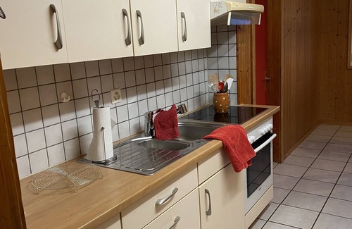 Fluehli Apartment | Gemütliche Ferienwohnung im Torbach in Historischem Glaserhaus