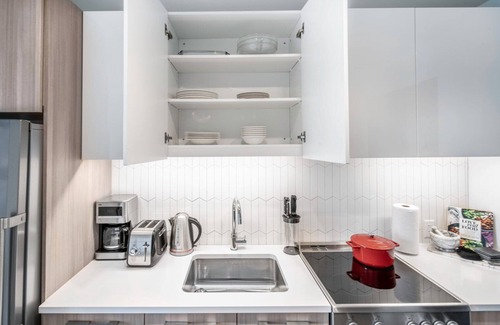 MIT Apartment | Gentle Kendall Sq Studio, Gym, Doorman, near MIT by Blueground