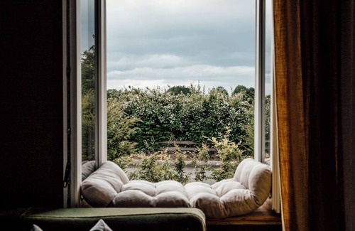 Schwienau House | Gentle luxury on the edge of the heath Constantia apartment with private garden