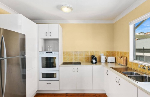 South Coast House | Gerroa House located mere steps from Seven Mile Beach.