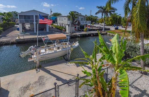 Cutthroat Harbor Estates House | Ginger's Paradise, 3 Bed, 2 Bath Canal Front Home in Cudjoe Key