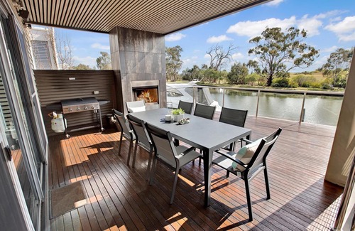 Paynesville House | Gippsland Lakehouse A: Magnificent home with jetty, fireplace & lake views