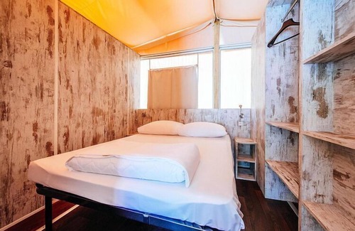 Zaton House | Glamping tent in Zaton Holiday Resort, with large pool area