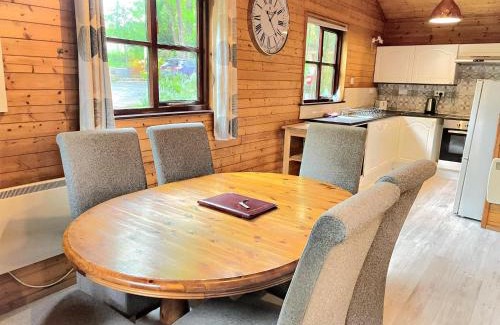 Llanybri Ski Chalet | Goldcrest 1-Hot Tub-Woodland Lodges-Carmarthenshire-Tenby