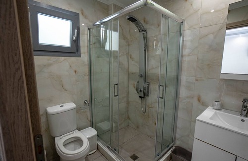 Alykes Apartment | Golden Dolphin Studios - 2 Bedroom House on the beach