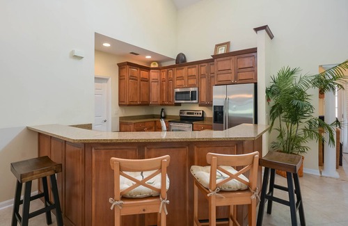 New Smyrna Beach House | Golf Course View Townhouse with a 2 Car Garage. Water Views! 1929T